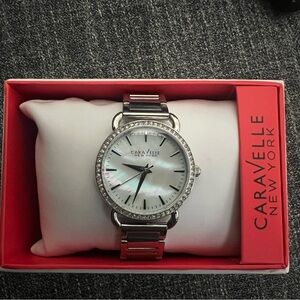 Caravelle women’s Watch, brand new never worn
Silver with opalescent face
